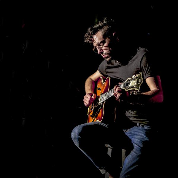 Ryan Garvey playing guitar